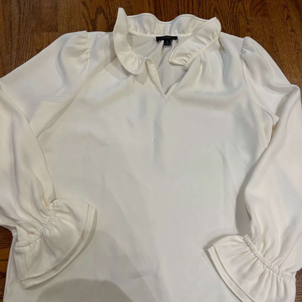 JCrew off white long sleeve ruffle neck blouse